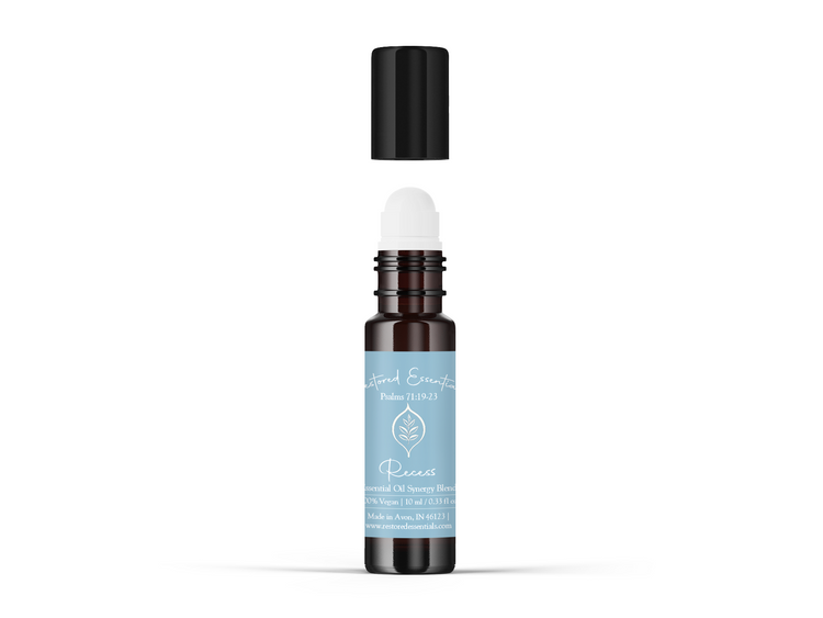 Kids essential oil blend blue bottle on white background