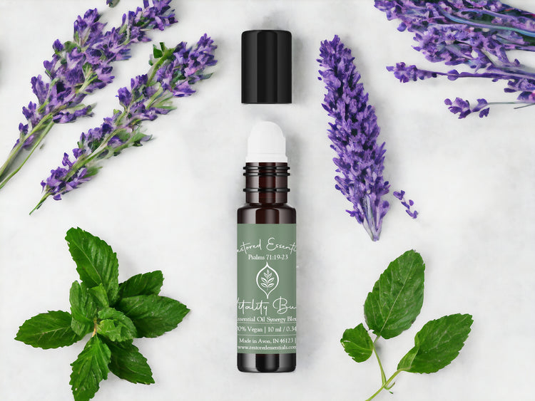 Essential oil roll-on with lavender and spearmint leaves